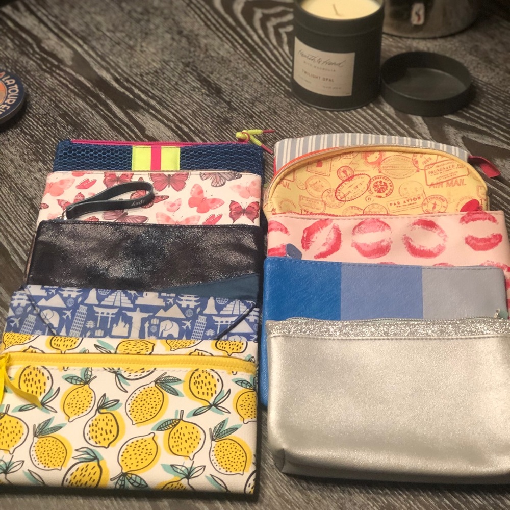 10 colorful Ipsy bags!